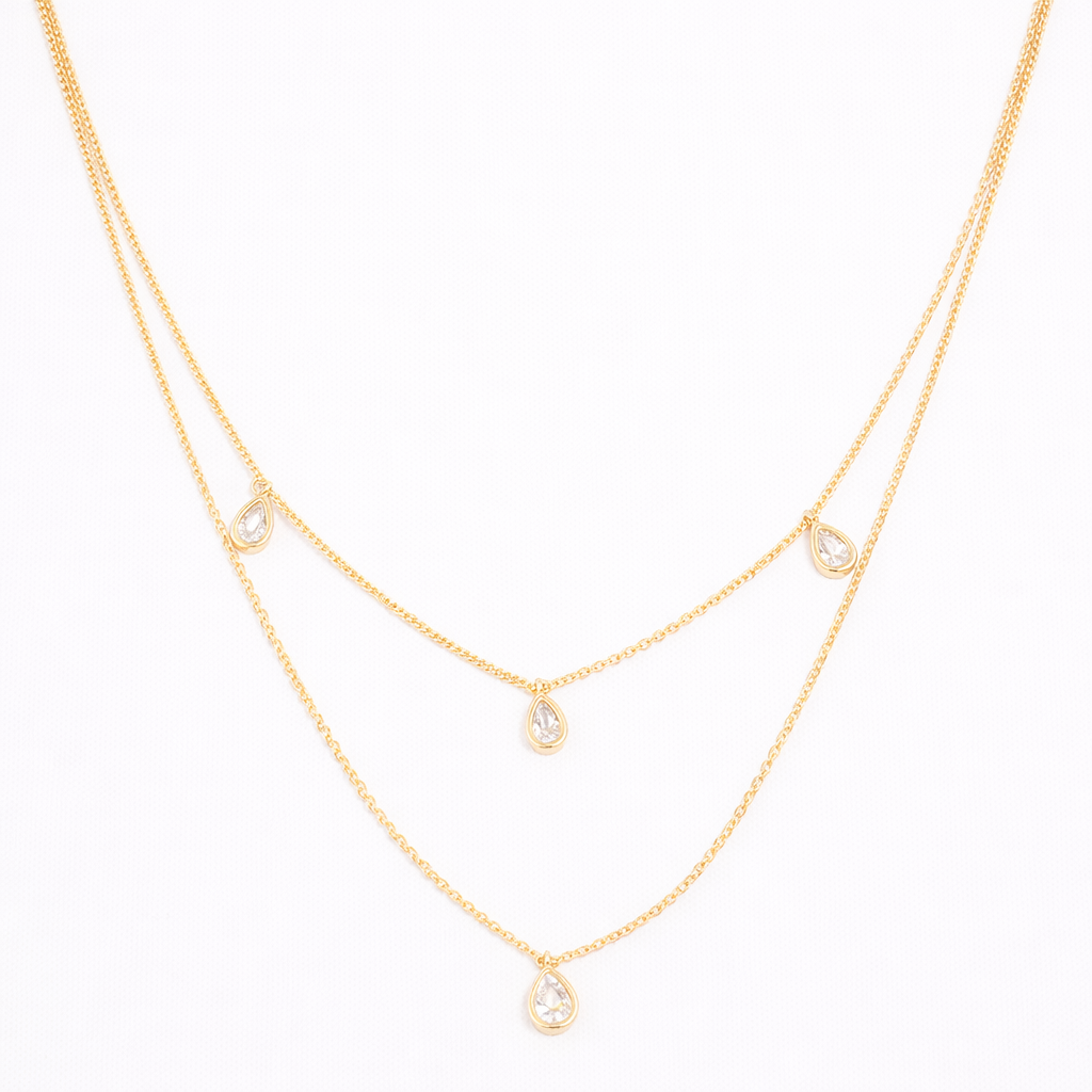 Collier doré multi-chaînes serti de zircons goutte – Élégance fluide