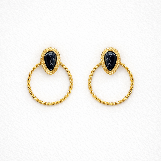 Boucles d’oreilles en cercle doré & pierre noire | Couture